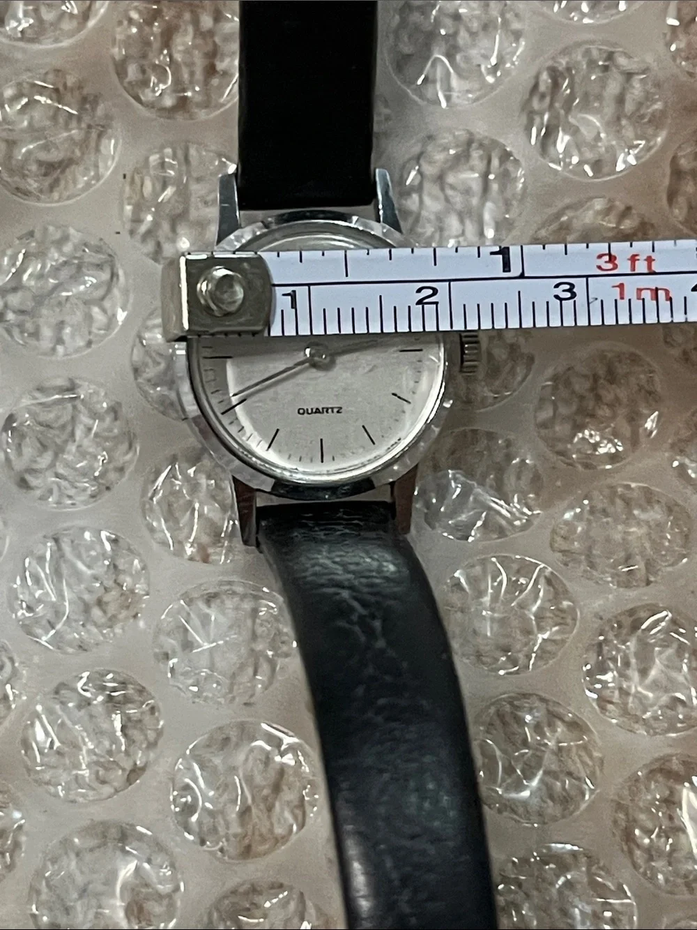 Women's Silver Dial Watch with Black Leather Strap